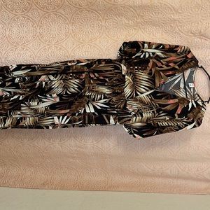 Brand new. Never wore, it was a bit big for my shoulder area